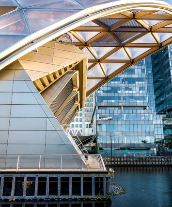 Crossrail Place in Canary Wharf, London's financial district, showcasing modern architecture and urban development.